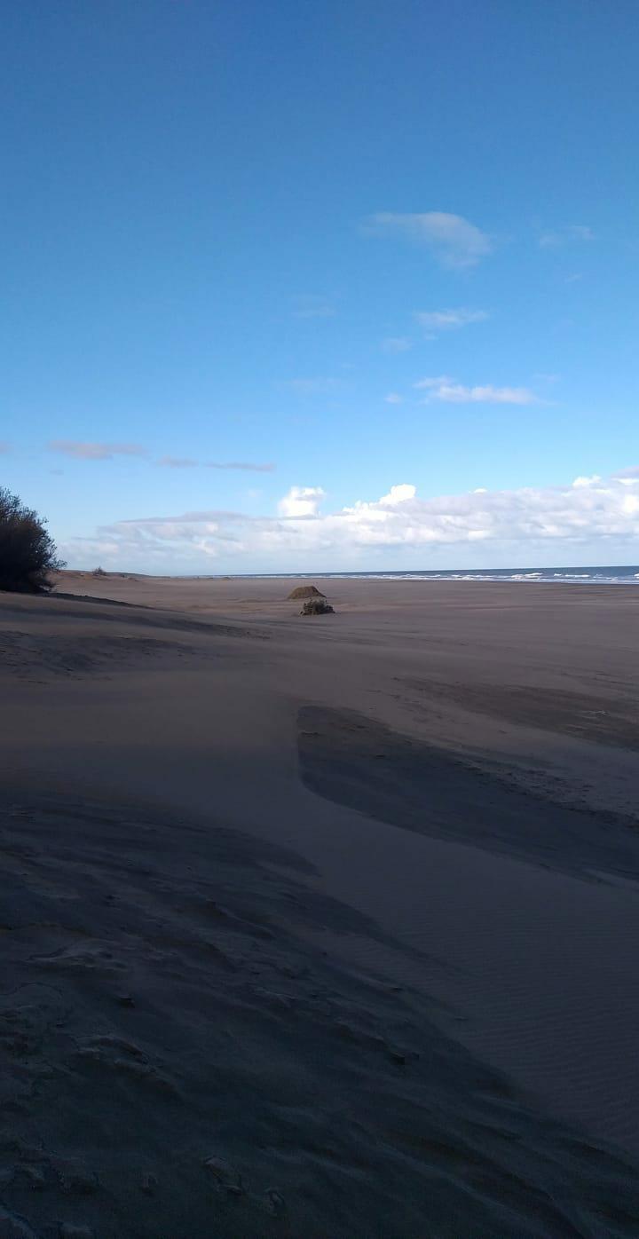 Donde se encuentran las dunas con el mar